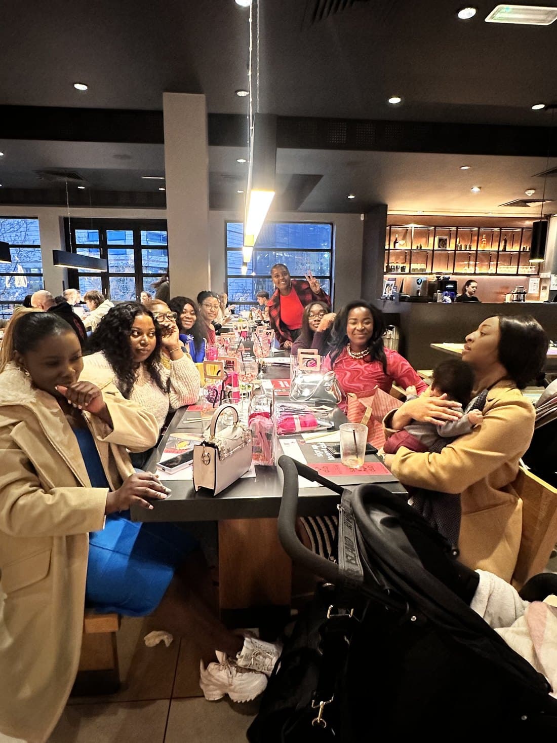 A support circle gathering around a long table